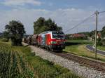 Die 1247 905 mit einem Güterzug am 20.07.2018 unterwegs bei Finklham.