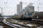 330091 von LTH mit einem leeren Holzzug in Hannover Misburg.