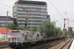 OHE 330094 am 13.7.13 mit einem leeren Res-Wagenzug in Düsseldorf-Rath.