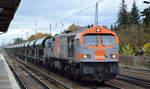 hvle- Havelländische Eisenbahn AG mit   V330.4  (NVR-Nimmer:  92 80 1250 004-9 D-HVLE ) und Ganzzug SChüttgutwagen am 29.10.20 Berlin Hirschgarten.