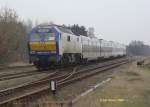 MaK DE 2700-11 der Nordostseebahn als Schublok auf der Marschbahn im Mrz 2009 unterwegs in Richtung Hamburg kurz hinter Michaelisdonn.