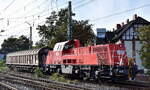 DB Cargo AG, Mainz mit ihrer  261 070-7  (NVR:  92 80 1261 070-7 D-DB ) und einem Schiebewandwagen am Haken am 18.10.23 Höhe Bahnhof Magdeburg Neustadt.