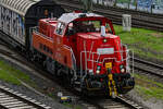 D-DB 261 028-5 kam am 17.04.2026 mit ihren  H-Wagen  vom Lübecker Konstinkai/ Konstinbahnhof (ALKO). Hier bei der Einfahrt in den Lübecker Hgbf (ALR).