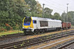 EHB Maxima 263001-0 rangiert hier am 19.08.2026 um 09.51 Uhr bei starkem Regen im Bahnhof Hasbergen.