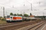 Mit einem Ganzzug Kesselwagen fhrt 264 012-6 der hvle durch MAgdeburg-Rothensee in Richtung Norden. Fotografiert am 06.08.2010. 