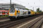 Eine sehr schne Lok wie ich finde... BR 264 009-2 Voith Maxima mit Bauzug bei der Durchfahrt in Mnchen am Heimeranplatz. Aufnahmedatum 03.07.2011