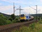 Die Stock Maxima 264 003 bespannte am 25.072014 einen Kesselwagenzug in Richtung Norden. Aufgenommen zwischen Friedland(HAN) und Eichenberg.