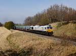 Die 247 052 mit einem Müllzug Freilassing am 20.03.2020 unterwegs bei Garching an der Alz.