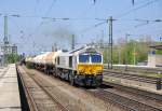 247 049 mit Kesselwagenzug in Mnchen-Heimeranplatz am 19.4.2011