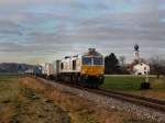 Die 247 048 am 27.12.2011 mit einem Containerzug unterwegs bei Heiligenstadt.