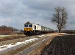 Der 247 049 mit einem Mllzug am 20.02.2012 unterwegs bei Alttting.