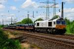 247 038 mit dem Gterzug bei Gelsenkirchen am 07.06.12.