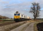 Die 247 043 und eine weiter mit einem Gaskesselzug am 27.12.2011 unterwegs bei Alttting.