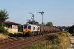 247 051 mit Kesselwagenzug am 28.08.2014 in Tüßling.