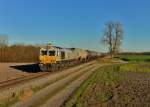 247 056 mit einem Kesselzug am 18.11.2015 bei Altötting. 