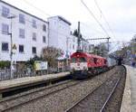 Die Class 66 DE6312  Alix  von Crossrail  kommt aus Richtung Köln,Aachen-Hbf und fährt durch Aachen-Schanz mit einem Containerzug  aus  Köln-Eifeltor(D) nach Genk-Haven(B) und
