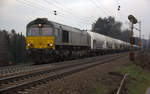 Die Class 66 DE6306 von Crossrail  kommt mit viel Dieselpower die Gemmenicher-Rampe hochgefahren aus Richtung Aachen-West in Richtung Montzen/Belgien mit einem langen Silozug aus Augsburg (D) nach Herentals(B) und fährt in Richtung Gemmenicher-Tunnel,Botzelaer(B),Gemmenich(B),Nouvelaer(B),Moresnet(B),Moresnet-Chapelle(B),Montzen(B). Aufgenommen an der Montzenroute am Gemmenicher-Weg.
Bei Regenwolken am Nachmittag vom 21.2.2019.