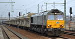 ITL mit CB 1001 [NVR: 92 80 1266 106-4 D-ITL] und einem Schüttgutwagenzug am 28.02.19 Bf. Flughafen Berlin-Schönefeld. 