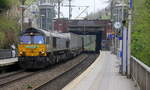 Die Class 66 266 035-5 von Railtraxx kommt mit viel Dieselpower aus Richtung Köln,Aachen-Hbf und fährt durch Aachen-Schanz mit einem Containerzug aus Köln-Eifeltor(D) nach Genk-Haven(B)