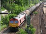 DE670 der HGK vor Kesselwagenzug in Mhlacker, 24.06.2007