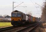 Passend zu den wenigen Sonnenstrahlen des heutigen Tages rauscht diese Class 66 aus Venlo kommend heran. Das Foto stammt aus Dlken und ist vom 29.12.2007