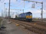 De Class66 van ERS op weg met containers op 12-3-2005