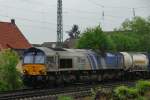 Kurz bevor der Himmel wieder seine Schleuen ffnete: Class 66, 6611 der ERS Railways, vor einem Containerzug unterwegs Richtung Heidelberg. (Zwingenberg, April 2009).