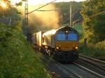 Richtig schwer hat die Class 66 PB 13 auf der Rampe kurz vor dem Gemmenicher Tunnel an ihrer Last zu schleppen. Laut drhnend mit einer Abgasfahne wie eine Dampflok und fast in Schrittgeschwindigkeit kommt der Zug am frhen Morgen des 14.07.2010 die Montzenroute von Aachen West nach Belgien hoch.