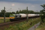 Captrain 266 002-9 mit einem Kesselwagenzug in Nauheim (bei Gro Gerau) am 03.08.2010