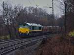 Eine Class66 (266 005-8) von Ascendos Rail Leasing Sarl aus Luxemburg kommt am 24.01.2011 mit einem leeren Bleierz Zug von Aachen West die Rampe zum Gemmenicher Tunnel auf der Montzenroute nach Belgien hoch. 