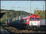 Gerade noch fuhr DE 13 der HGK durch Kln West, da kommt aus der anderen Richtung bereits ein weitere Grodiesellok der HGK: DE 670 mit Containerzug (30.09.2011) 