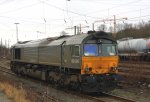 Die Class 66 DE6306 von DLC Railways steht abgestellt an der Laderampe in Aachen-West bei Wolken am 29.12.2011.