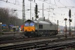 Die Class 66 DE6302 von DLC Railways rangiert in Aachen-West bei strmenden Regen am 21.1.2012.