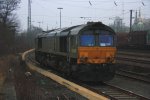 Die Class 66 DE6306 von DLC Railways  steht abgestellt an der Laderampe in Aachen-West bei Wolkwn am 1.3.2012.