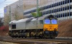 Die Class 66 DE6302 von DLC Railways kommt als Lokzug aus Montzen(B) und fhrt in Aachen-West ein bei Sonne und Wolken Mix am 11.3.2012.