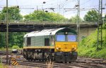 Die Class 66 PB15  von Railtraxx BVBA kommt als Lokzug aus Montzen(B) und fhrt in Aachen-West ein bei Regenwetter am 24.6.2012.