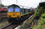 Die Class 66 PB14 von Railtraxx BVBA steht in Aachen-West bei Regenwolken am 14.7.2012.