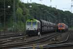 Captrain Class66 6601 mit einem Kohlenzug und 1216 903 von RTS mit einen Getreidezug am 06.08.2012 in Aachen West.