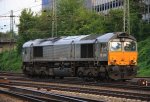 Nochmal die Class 66 DE6306 von DLC Railways rangiert in Aachen-West in der Abendstimmung am 22.8.2012.