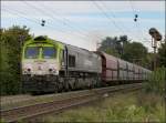 Unterwegs auf der Montzenroute ist diese Captrain Class-66 aus Bottrop kommend. Mit leeren Kokswaggons am Haken gehts in Richtung Belgien. Bildich festgehalten am Gemmenicher Weg bei Aachen im Oktober 2012.