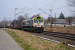6601 von Captrain mit einem Leerzug Rungenwagen bei Rimburg / bach-Palenberg, am 30.3.2013 nach Aachen.