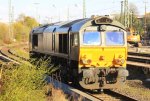 Die Class 66 DE6306 von DLC Railways steht abgestellt an der Laderampe in Aachen-West bei der in Abendsonne am 24.4.2013.