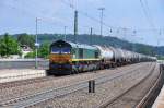 DE 678 in HGK Diensten ist auf der Filsbahn mit einem Kessel unterwegs Richtung Stuttgart.Aufgenommen im Bahnhof Amstetten(Wrtt.)am 10.7.2013.