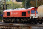 Die Class 66 DE6302  Federica  von Crossrail steht mit einem Getreidewagen in Aachen-West an der Laderampe bei Wolken am 3.11.2013.