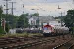 266 071-0 (DE 671) der HGK donnert mit einem Silowagen-Ganzzug um die letzte Biegung vor Köln West.