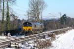 MRCE 653-05 in Diensten von Trainsport kehrt solo von Aachen-West zurück nach Montzen. Die Aufnahme entstand am 10/01/2009 am Gemmenicher Weg kurz vor der deutsch-belgischen Grenze.