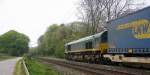 Ein Blick auf die Class 66 PB20 von Railtraxx BVBA.
Sie zieht einen KLV-Containerzug aus Frankfurt-Höchstadt am Main(D) nach Genk-Goederen(B).
Aufgenommen an der Montzenroute am Gemmenicher-Weg. 
Bei Sonne und Wolken am 2.5.2015.