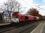 Die Class 66 DE6314  Hanna  von Crossrail  kommt aus Richtung Aachen-West mit einem langen Containerzug aus Zeebrugge-Ramskapelle(B) nach Milano(I) und fährt durch Aachen-Schanz in Richtung