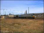 Nachdem PB18 stundenlang in Lutherstadt Wittenberg auf Weiterfahrt wartete, dst sie nun gen Sden und passiert hier gerade mit ihrem Containerzug den Bf Jessen(Elster). Links im Bild erkennbar die alte Gleiswaage fr Gterwagen des Bahnhofs Jessen(Elster). 06.03.07