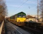 Die Class 66 RL002/V270 von der Rurtalbahn-Cargo kommt als Lokzug aus Geleen-Lutterade(NL) nach Aachen-West(D) und fährt die Kohlscheider-Rampe hoch aus Richtung Herzogenrath und fährt in